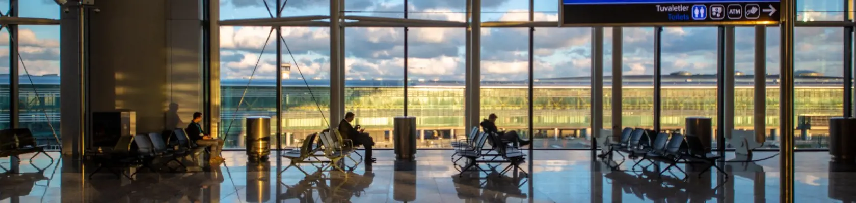 passengers sitting in the airport waiting room