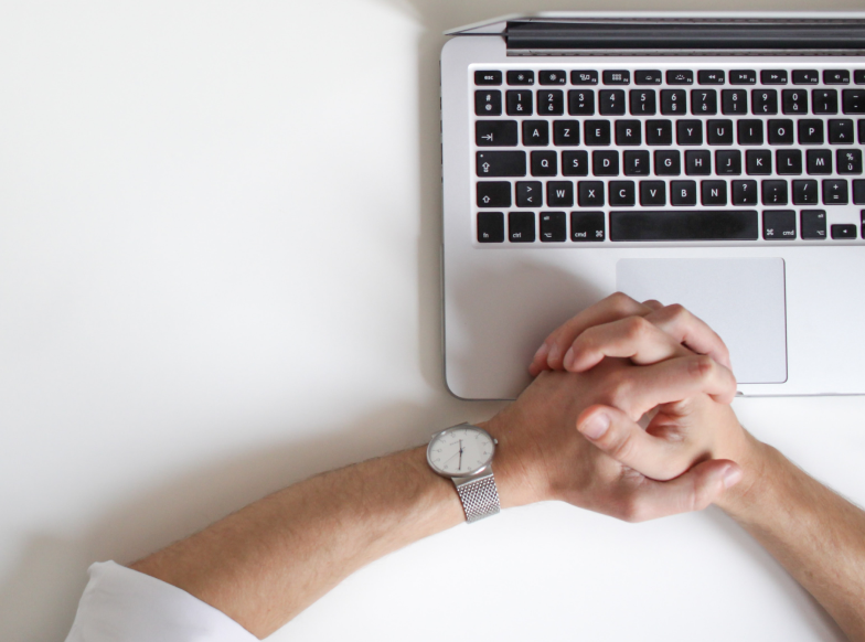 macbook air keyboard and employee hands