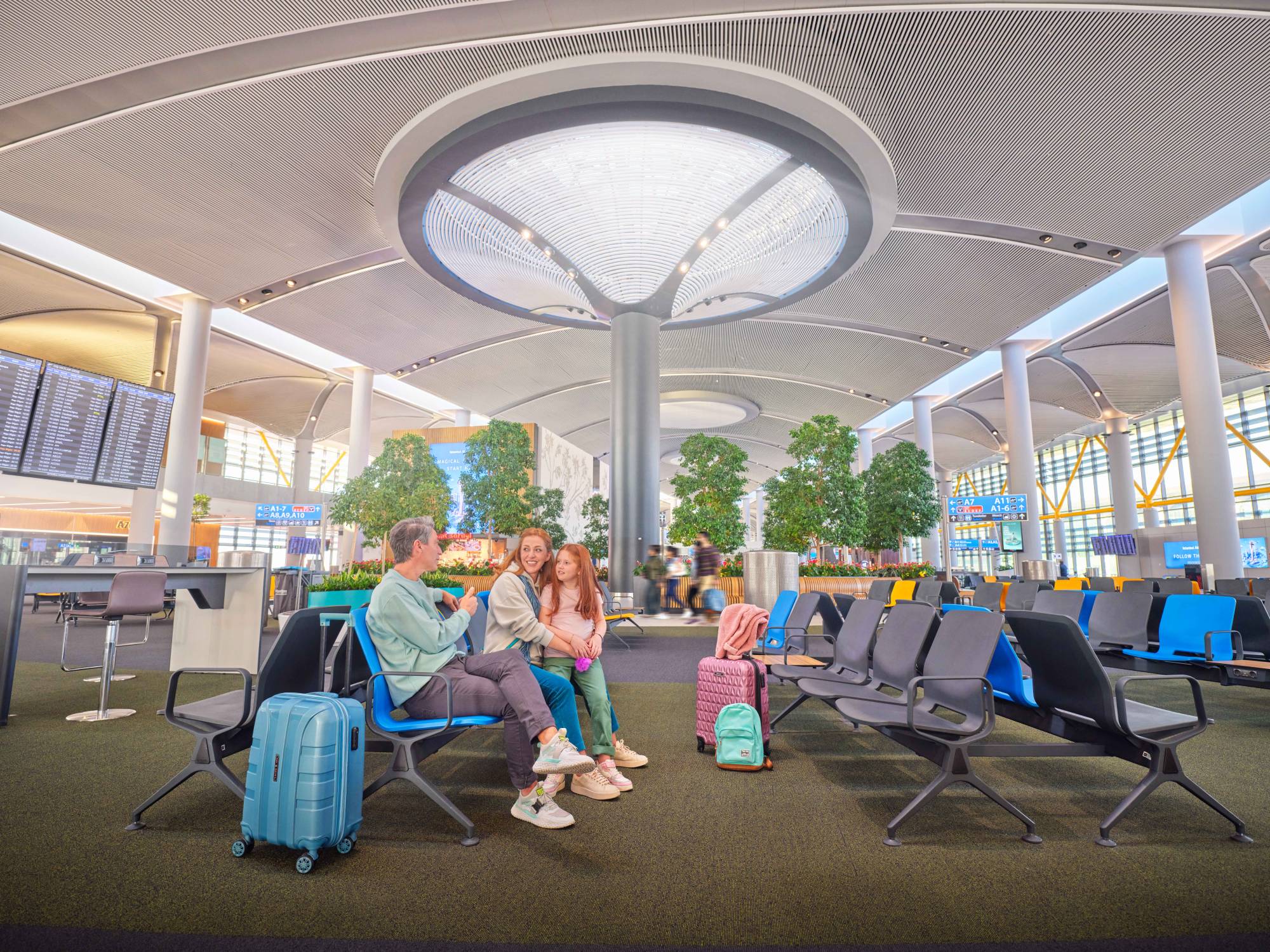 istanbul airport family sitting in the waiting area