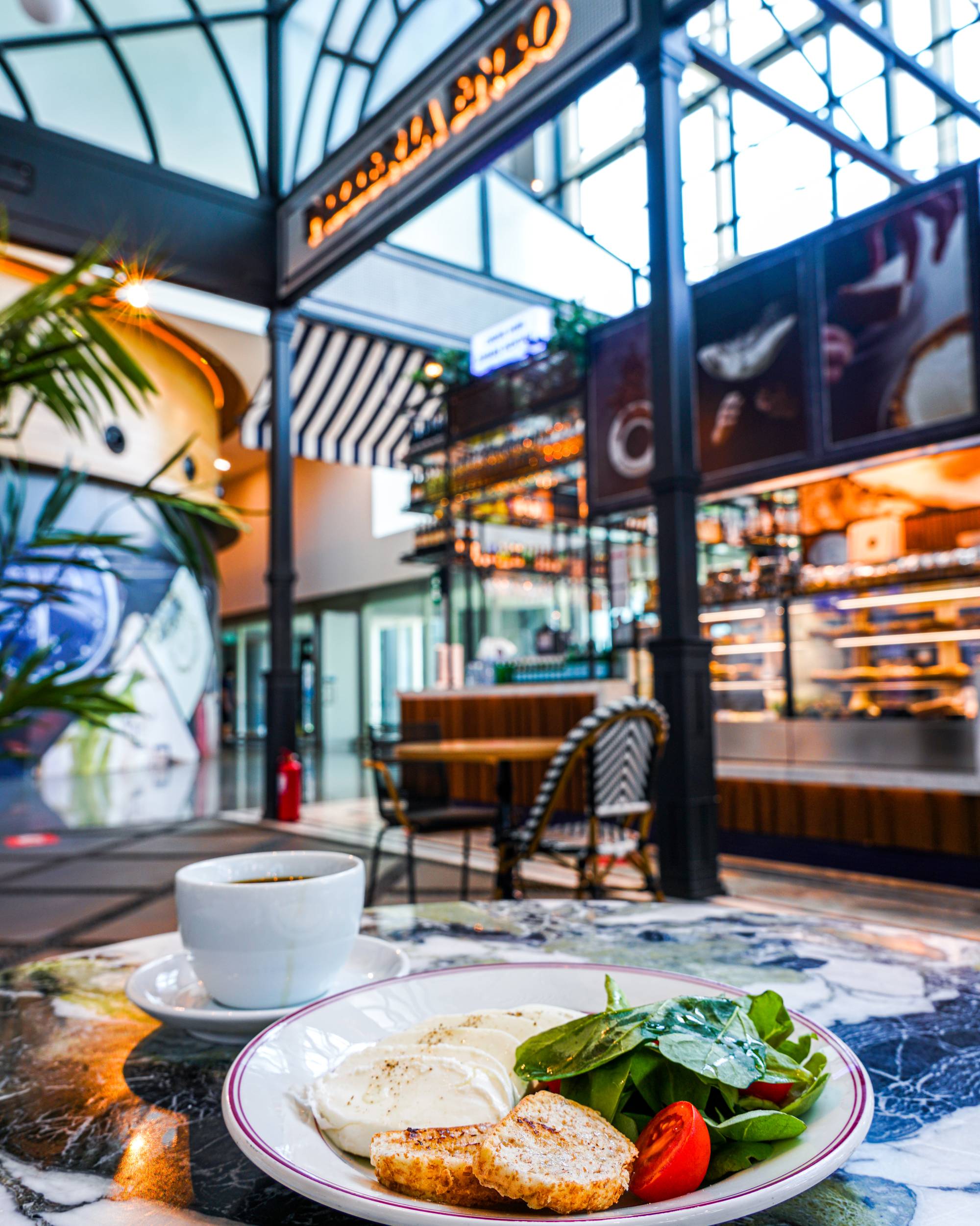 a healthy plate and a coffee