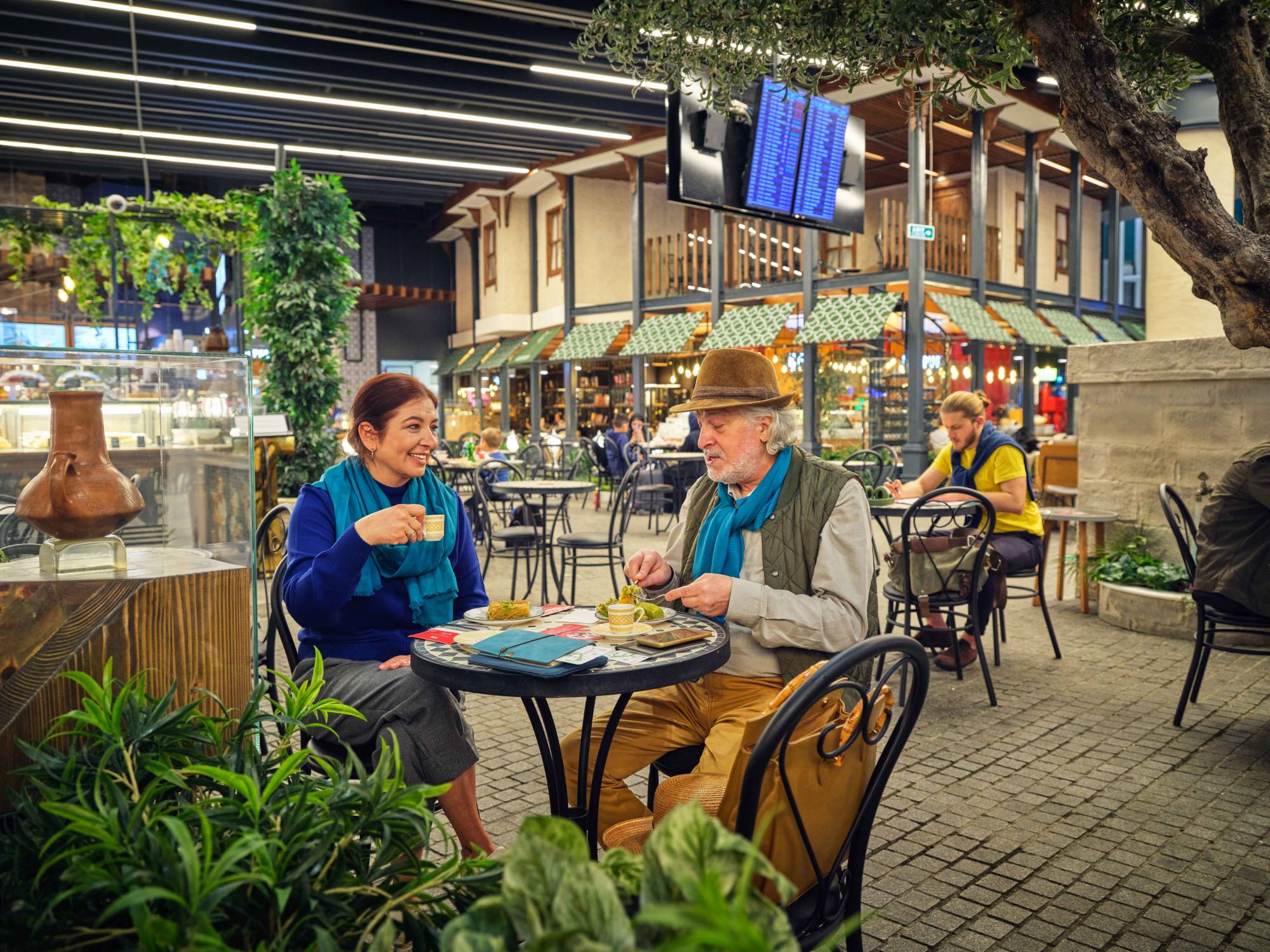 the old couple who eat sweet at the airport