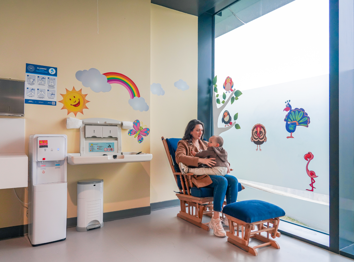 mother and baby in the baby room