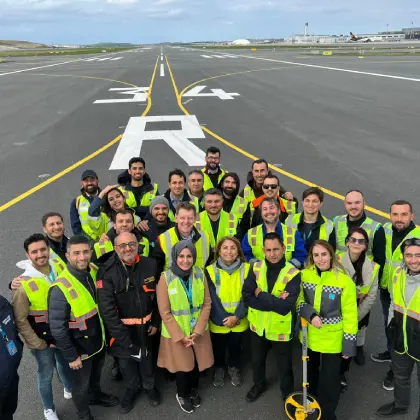 iga employees photographed in the apron parking area
