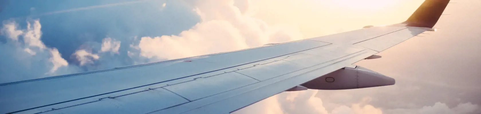 airplane wing photo in the sky